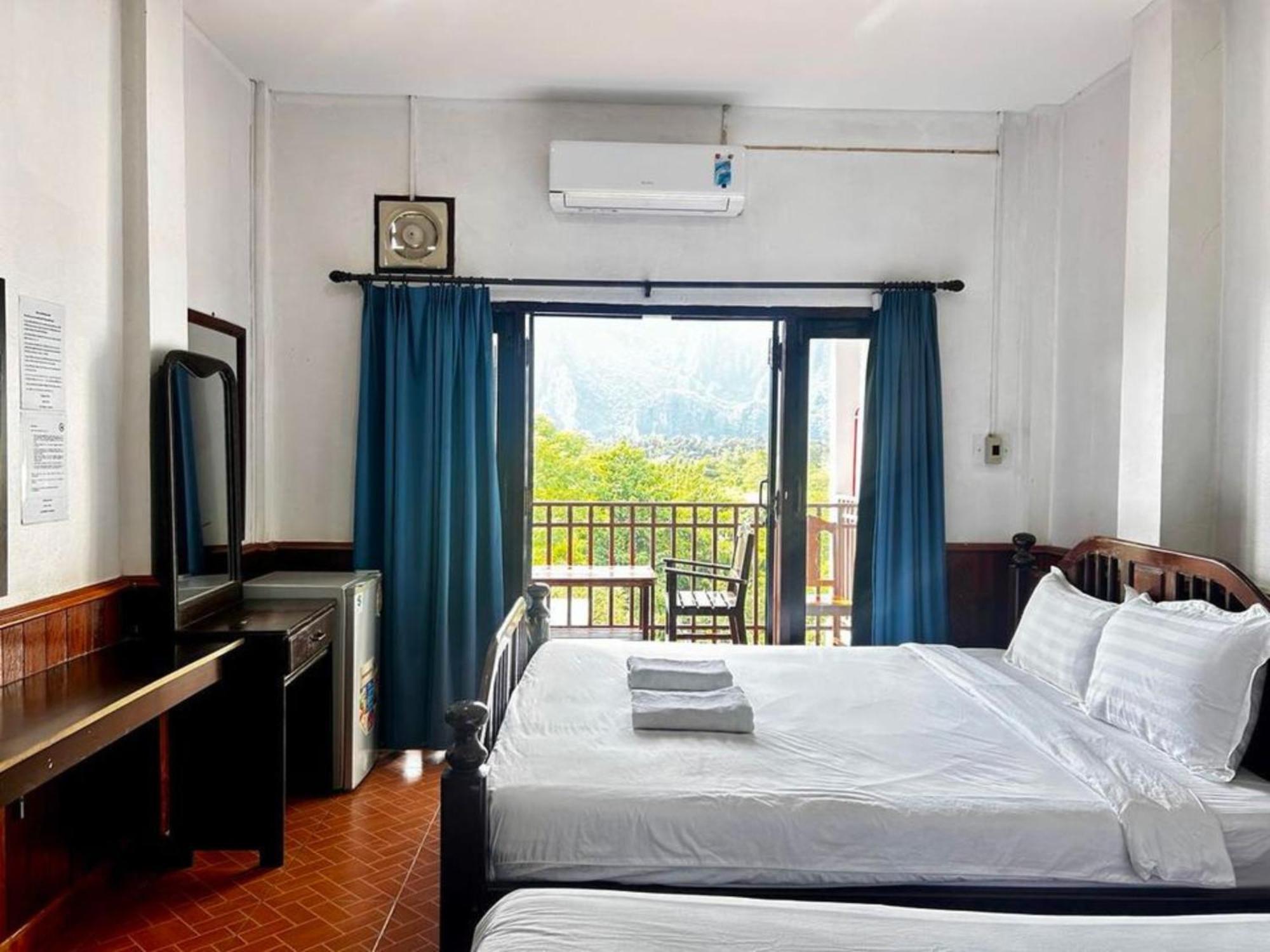 Domon Riverside Hotel Vang Vieng Esterno foto